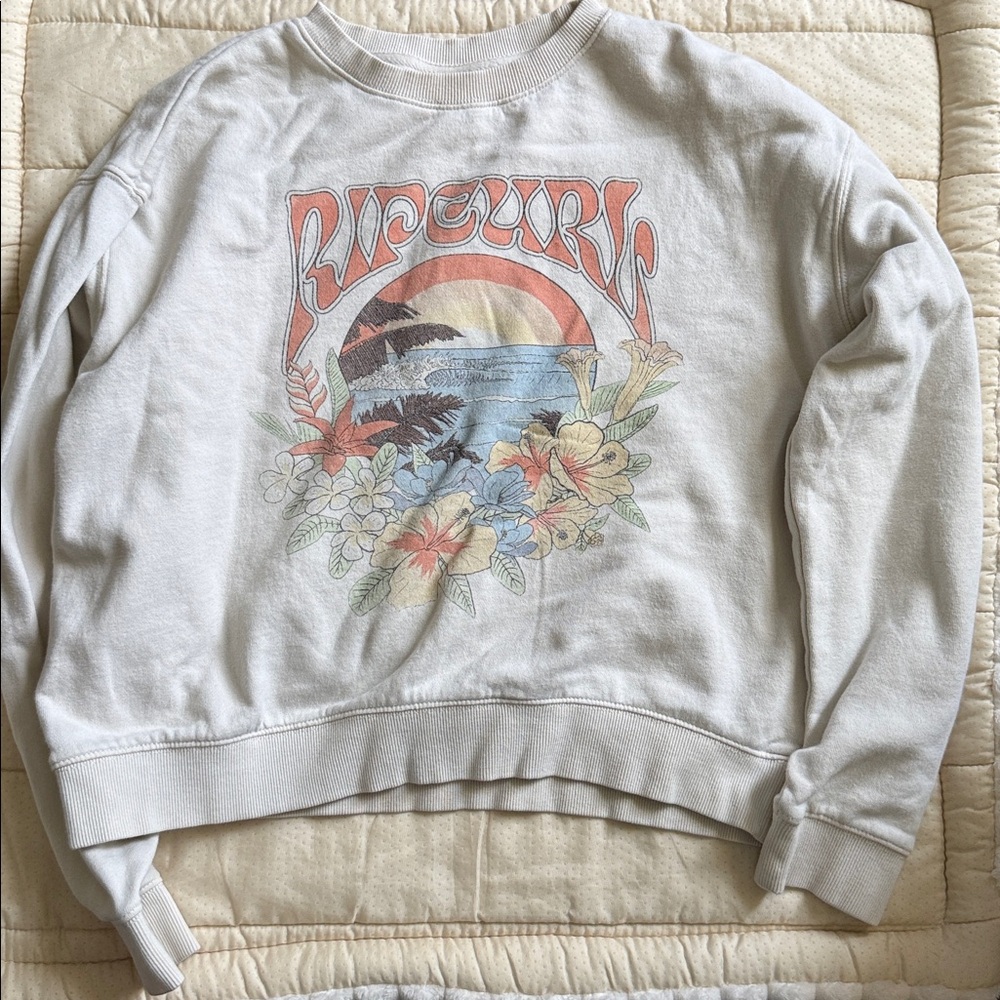 Rip Curl Cream Sweatshirt with Floral and Sunset Design